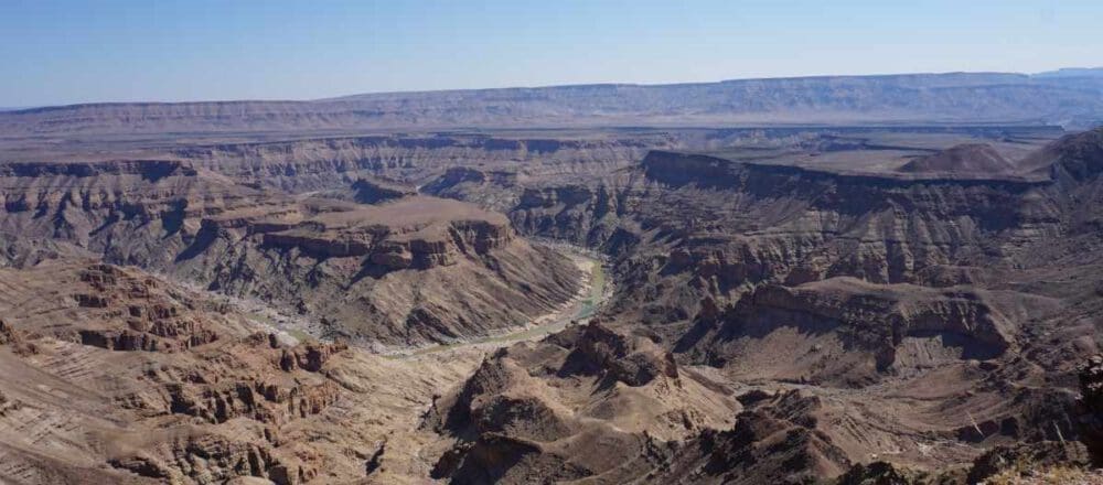 header image fish river canyon with water - Dusty Trails Safaris Namibia & Dusty Car Hire Namibia