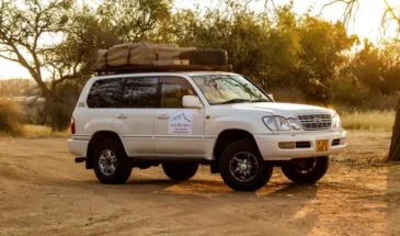 Toyota Land Cruiser 100 series with rooftop tent